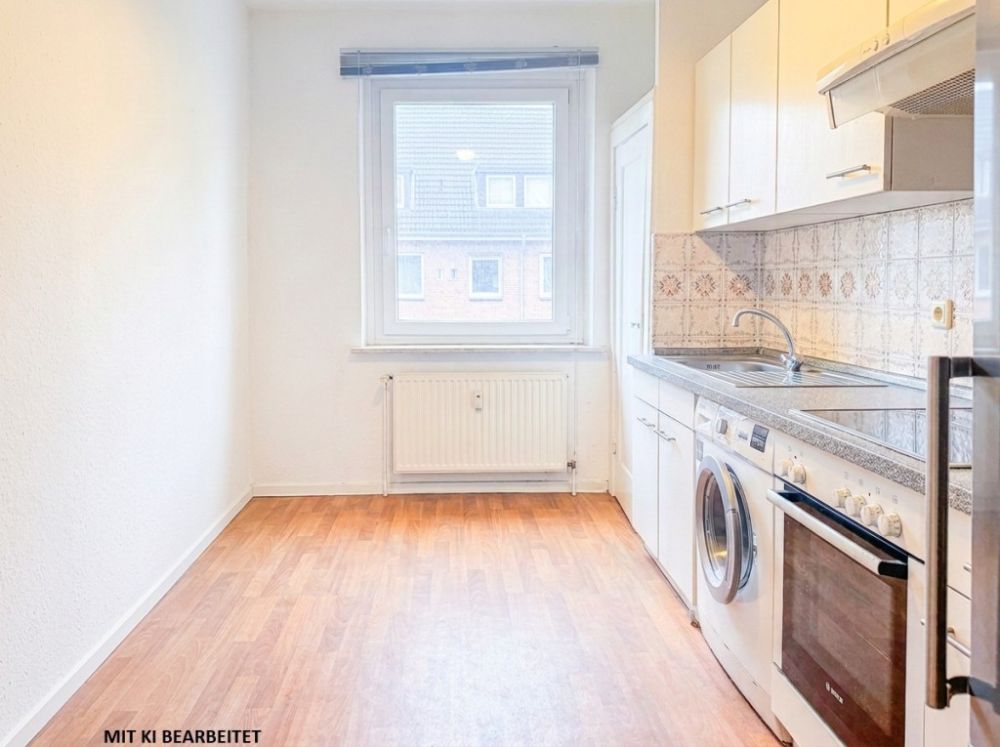 Charmante 2-Zimmer-Wohnung mit neuer Einbauküche in ruhiger Lage - Photo 4